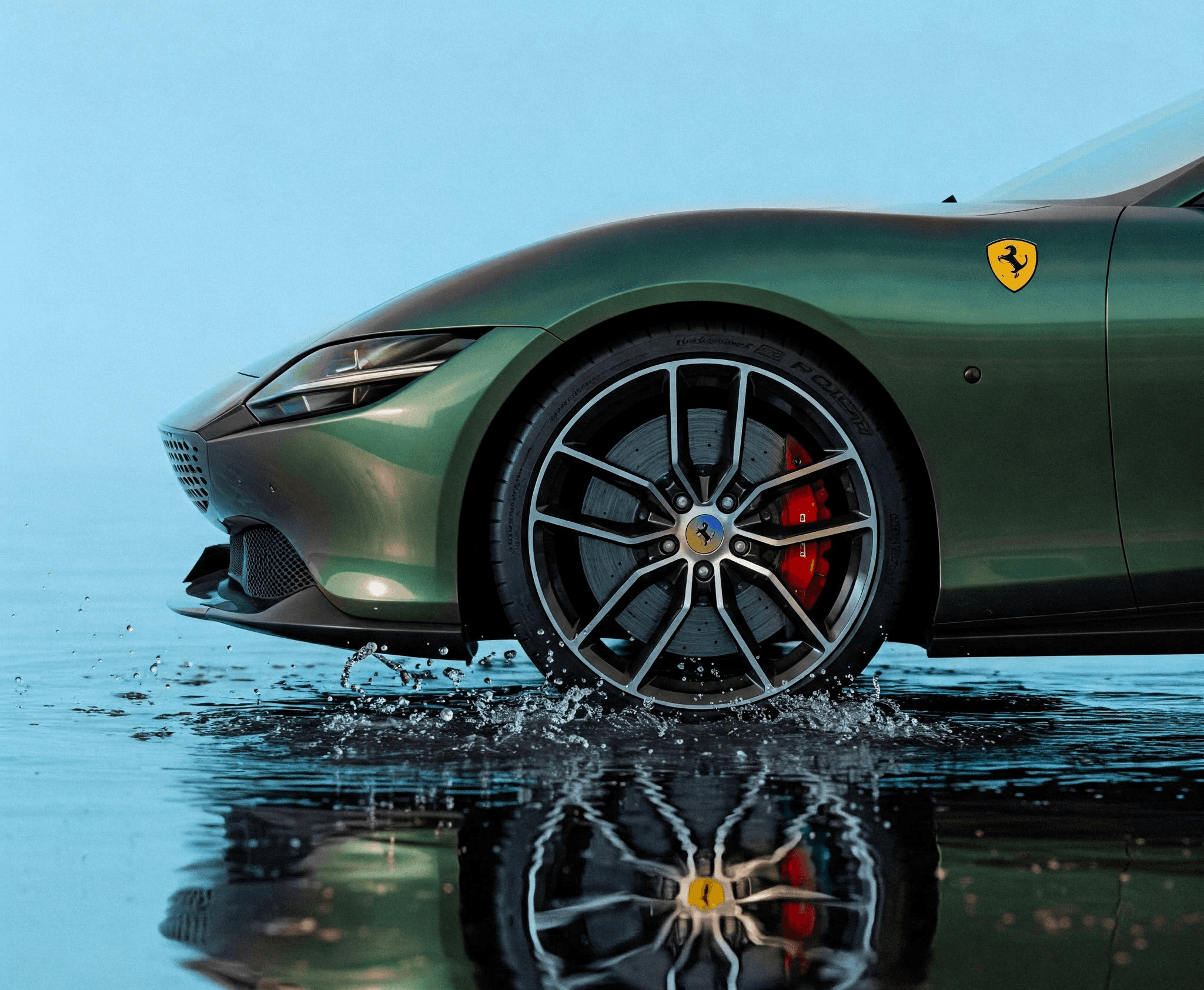 Ferrari — dettaglio ruota e riflesso